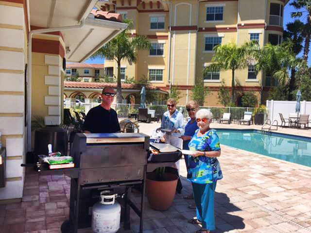 A group of residents enjoying a grill outside