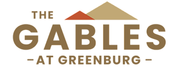 Elegant logo for The Gables at Greenburg featuring minimalist roof silhouettes in warm tones, highlighting a sophisticated housing community.