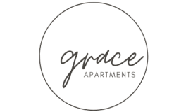 Elegant Grace Apartments logo in a minimalist circular design, embodying modern living.