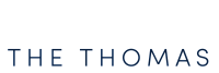Elegant branding for The Thomas by Wilcox Communities, showcasing modern and stylish text design.