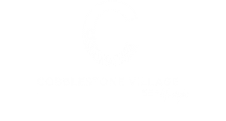 White Transparent Logo for Cobblestone Village 55+ Lifestyle: a white uppercase “C” with a grass silhouette at its base on a dark background, with “COBBLESTONE VILLAGE” in white uppercase letters beneath and a cursive “55+ lifesty