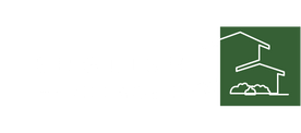 Transparent white logo for English Village II with clean modern text and a minimalist outline of a house on the right side.