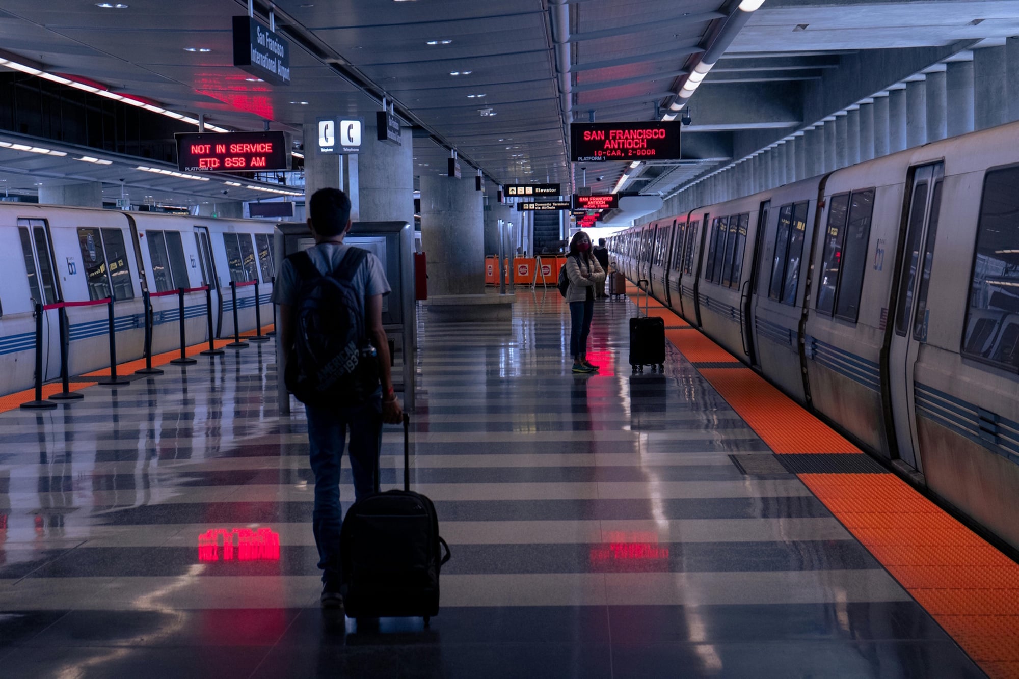 BART service with riders boarding near Dublin/Pleasanton