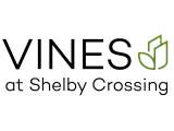 Elegant logo for Vines at Shelby Crossing, featuring modern and sleek typography with a leaf design.