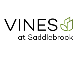 Elegant logo for Vines at Saddlebrook with a modern leaf design, conveying a sleek and contemporary brand identity.