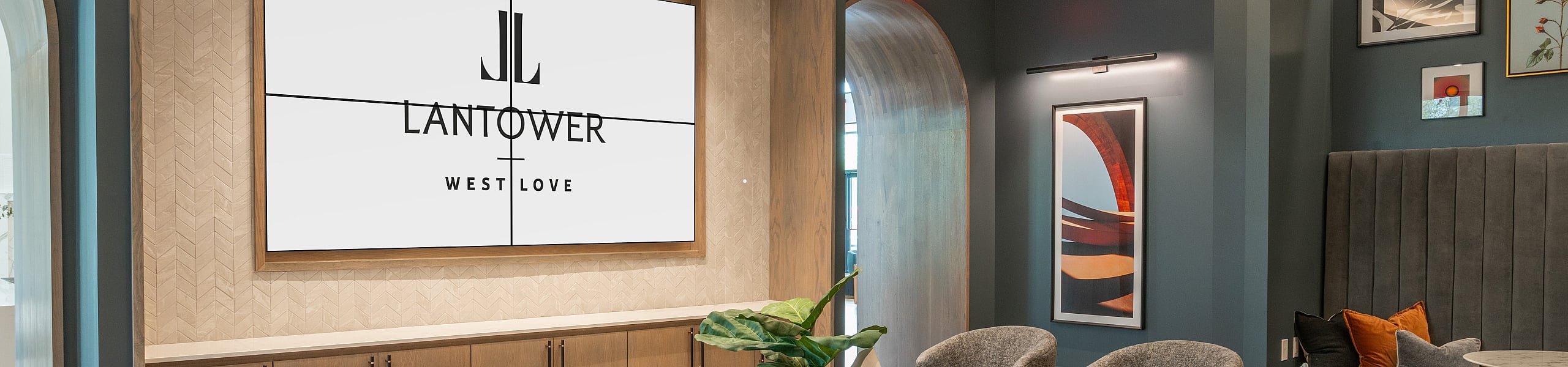 Elegant living area in a luxurious apartment featuring plush seating, modern decor, and ambient lighting, perfect for relaxation and entertainment.