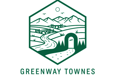 Charming Greenway Townes logo featuring a scenic landscape with winding paths, bridges, and mountain views.