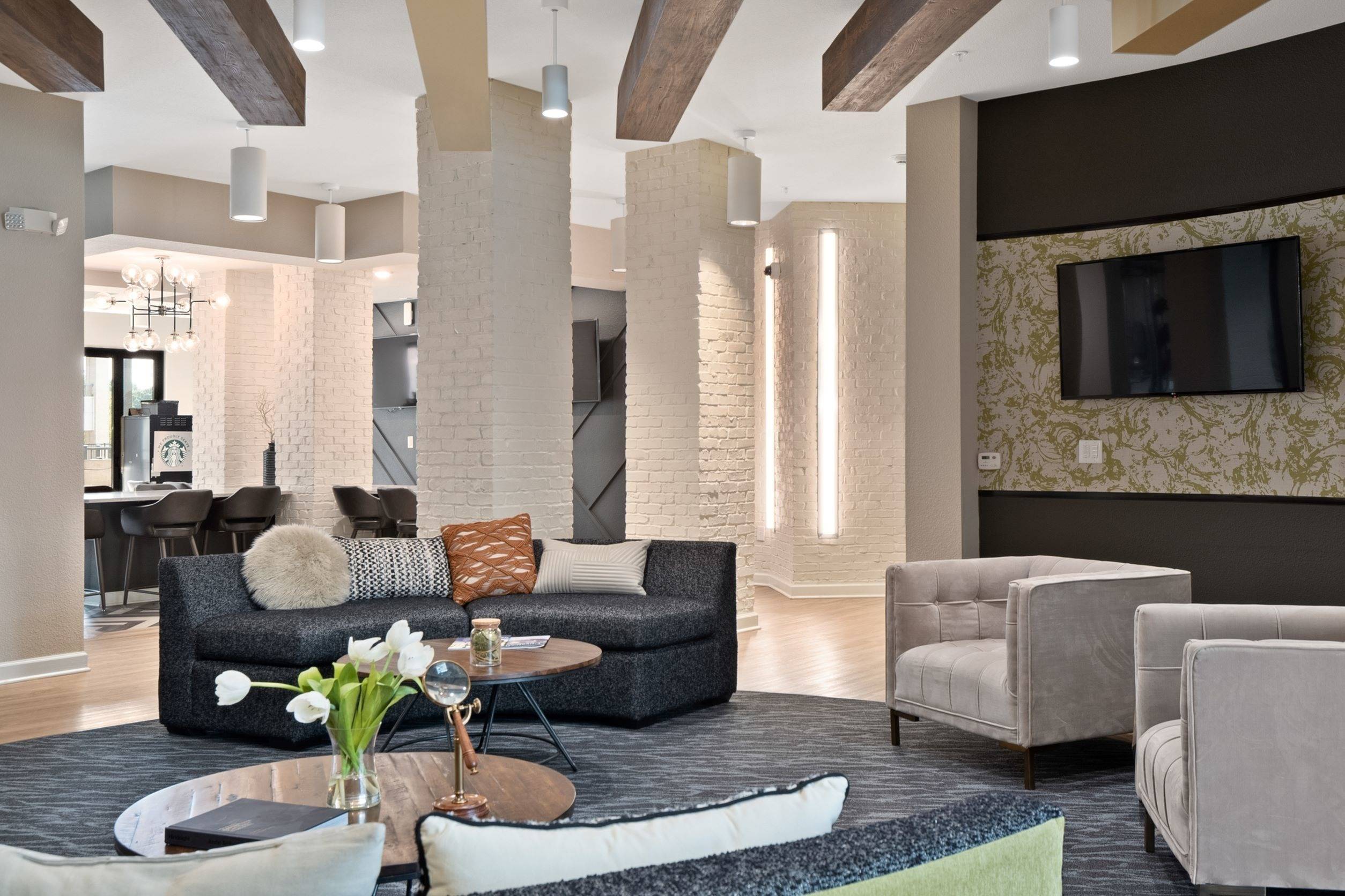 Clubhouse with TVs and coffee bar