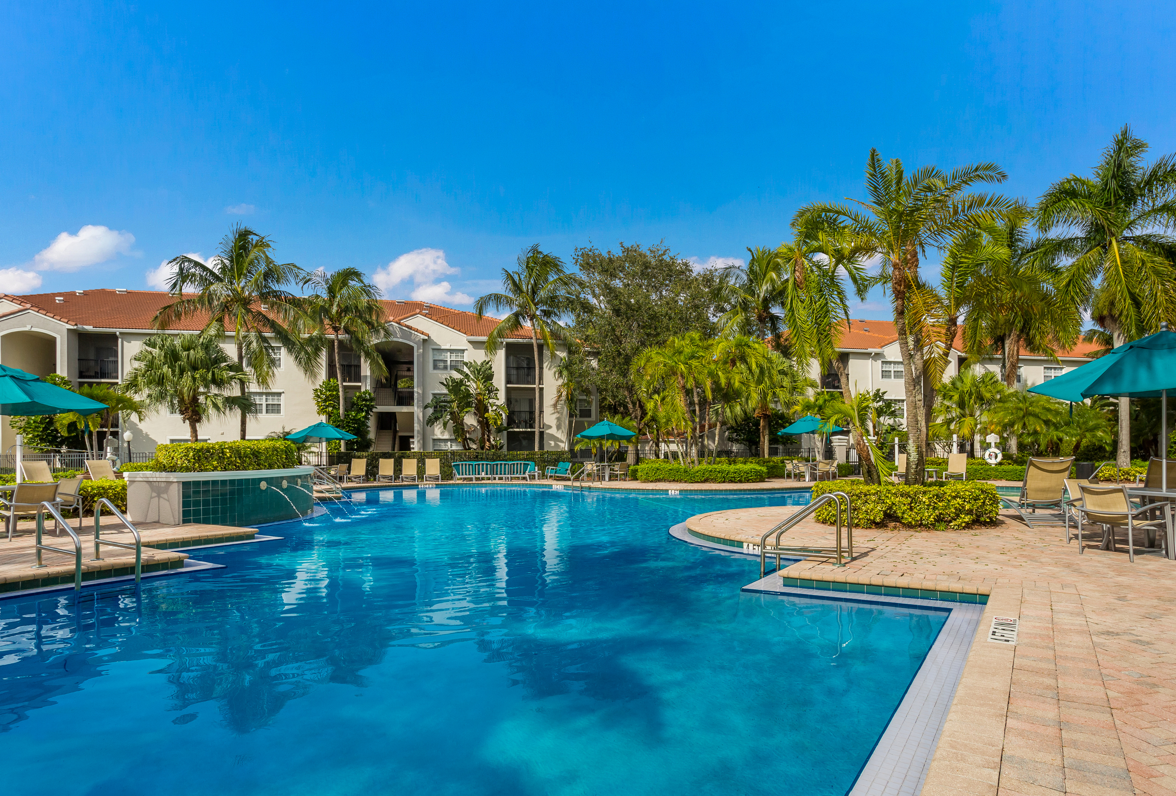Woodbine pool and tropical landscaping