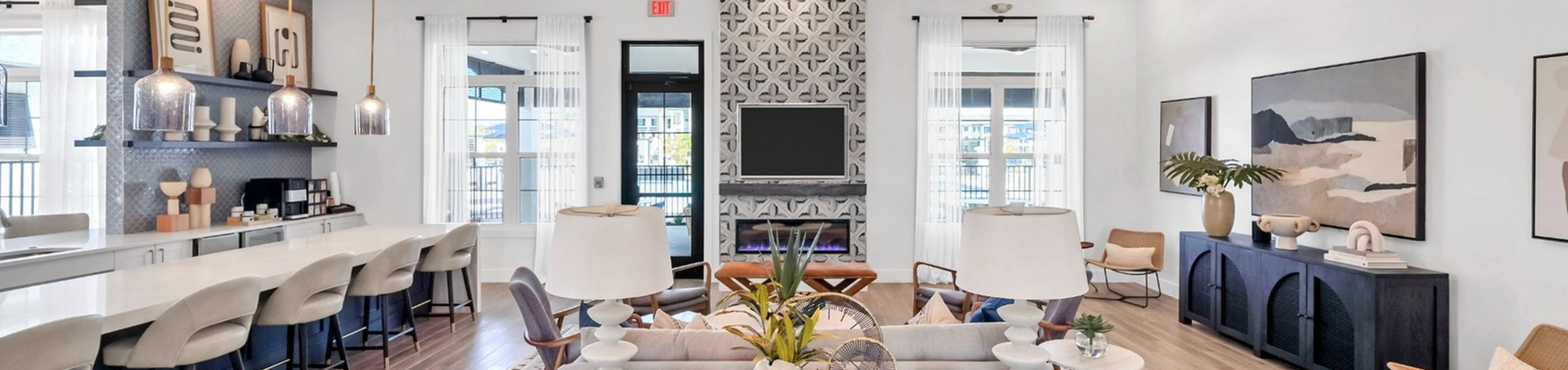 Elegant and modern open-concept living area featuring stylish decor, ambient lighting, and a spacious layout perfect for entertaining.