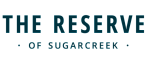 Logo of The Reserve of Sugarcreek featuring elegant and modern typography, suggesting a premium residential community.