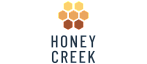 Elegant Honey Creek logo with a honeycomb design, symbolizing warmth and community.