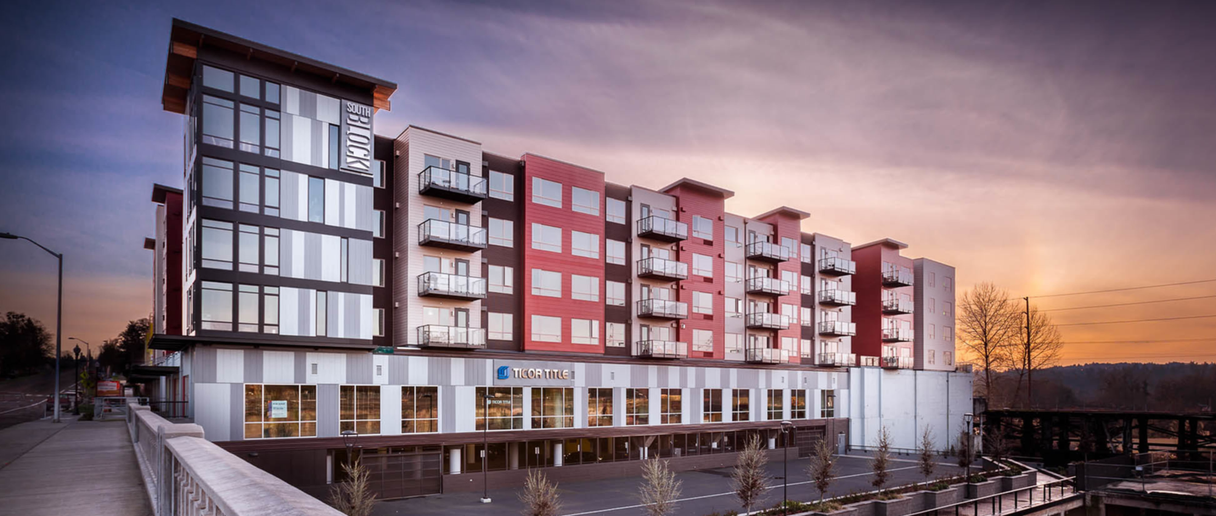 View across river at South Block Apartment building