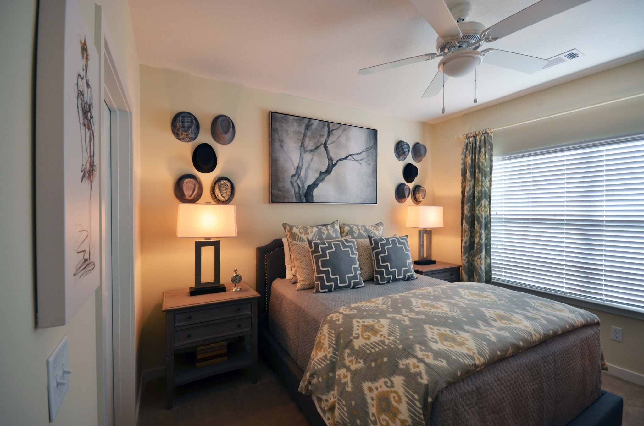 Furnished model guestroom with large window