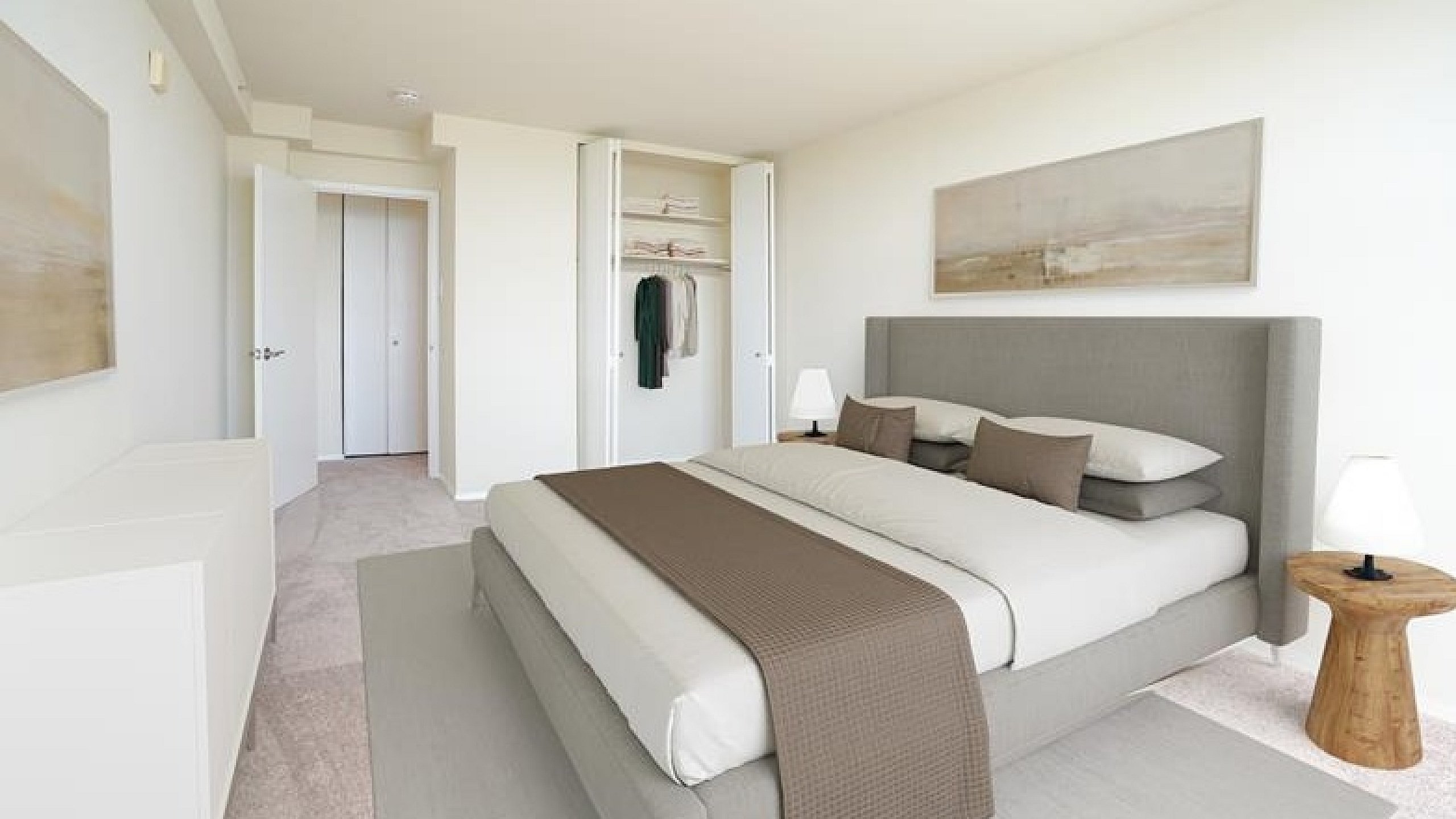 Elegant bedroom with plush bedding, a stylish gray headboard, and natural light streaming in, highlighting a spacious open closet.