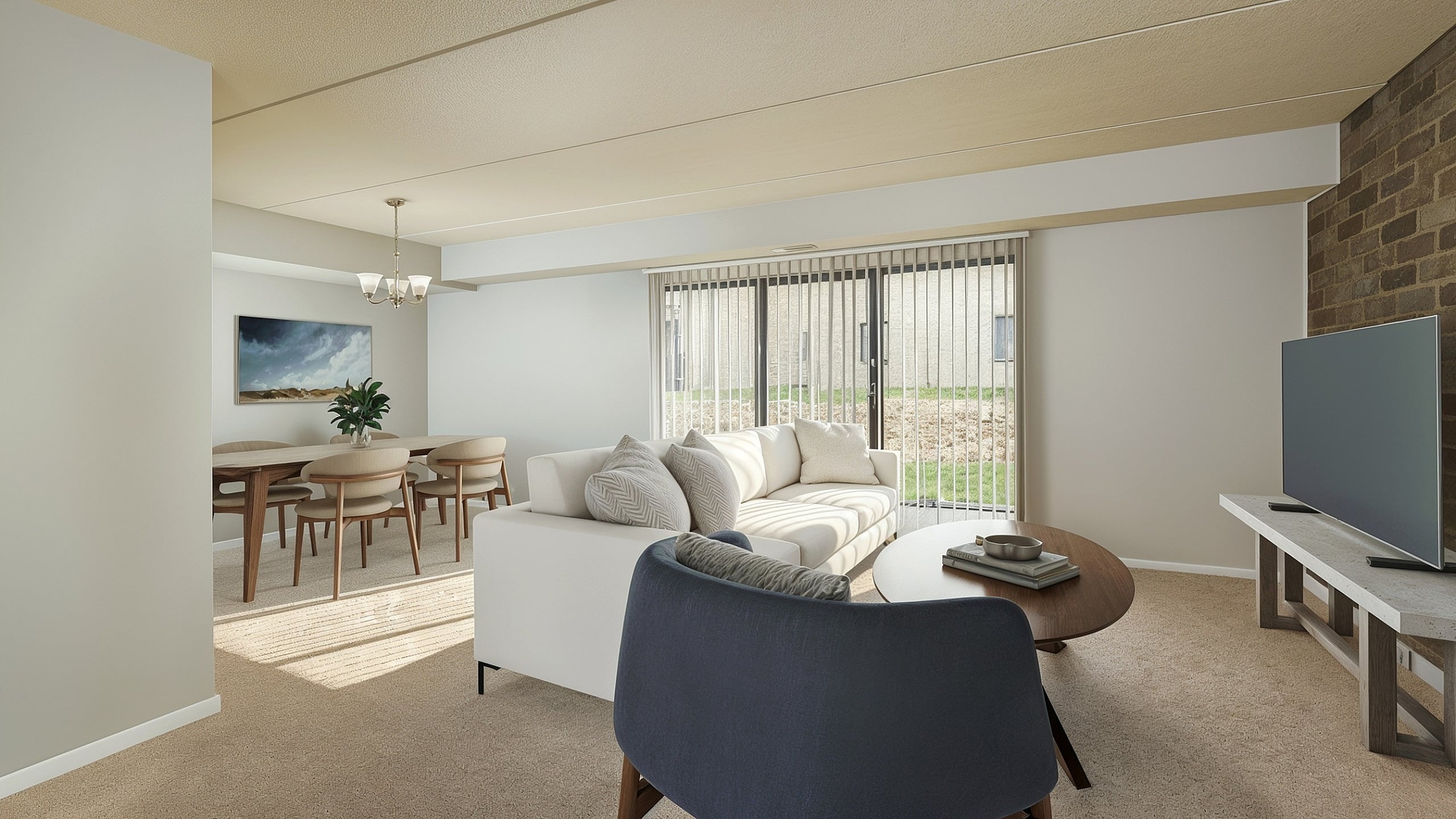 Elegant open-concept living and dining area with modern furnishings, large windows, and a cozy ambiance.