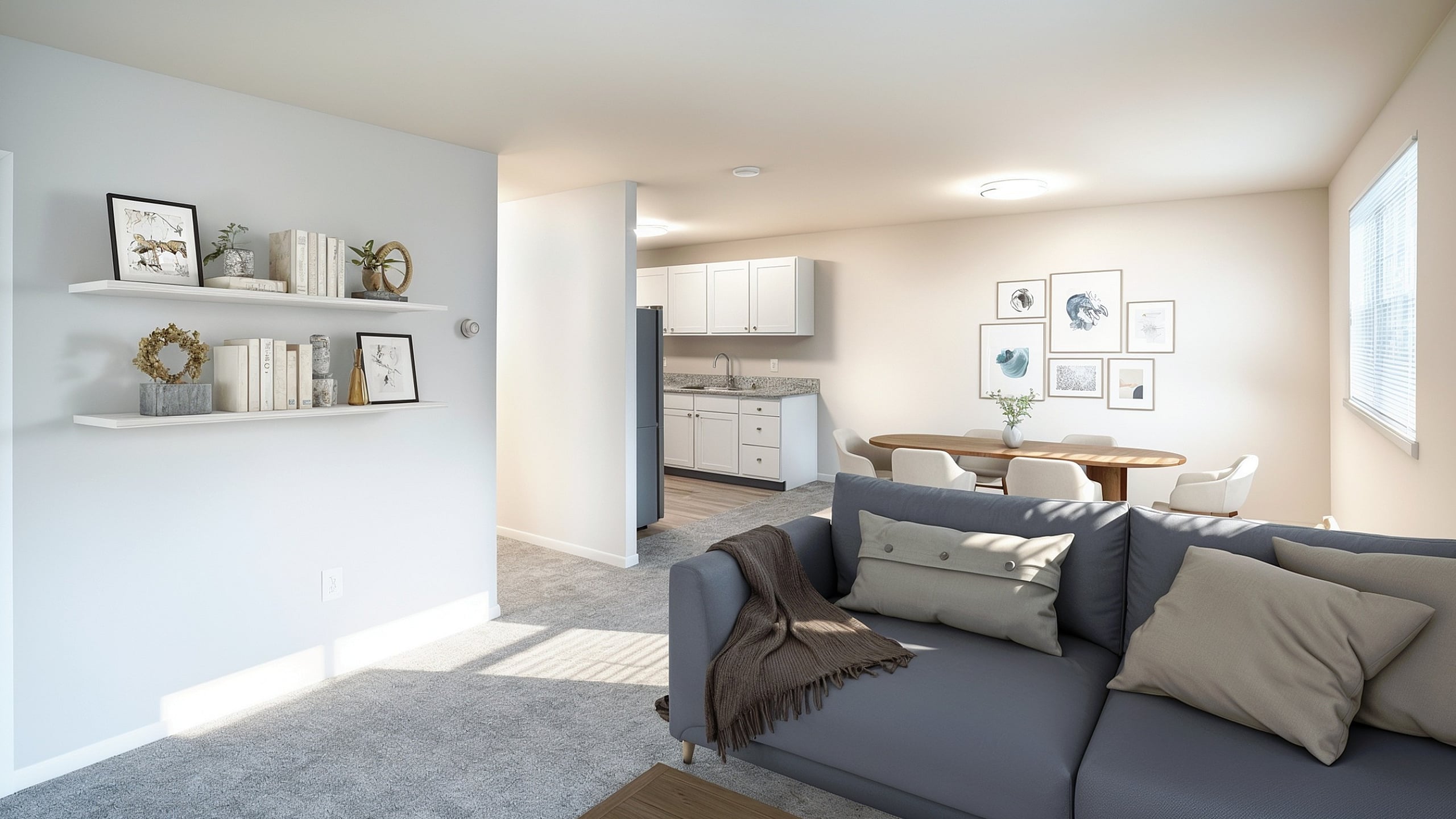 Bright and inviting living space with comfortable seating, elegant decor, and an open kitchen-dining area in a modern apartment.