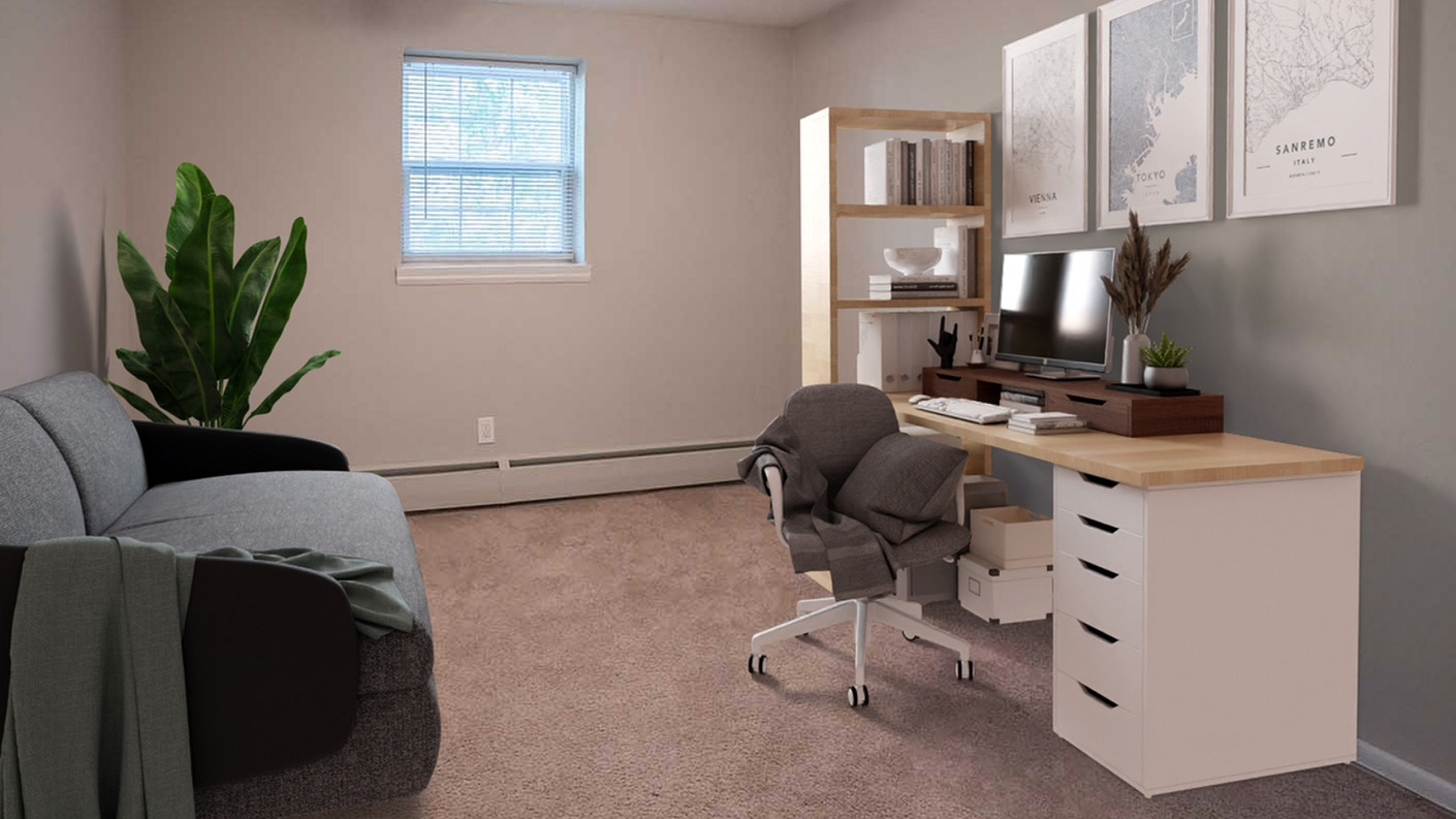Inviting home office with a cozy grey sofa, modern desk setup, and elegant decor, perfect for productivity and relaxation.