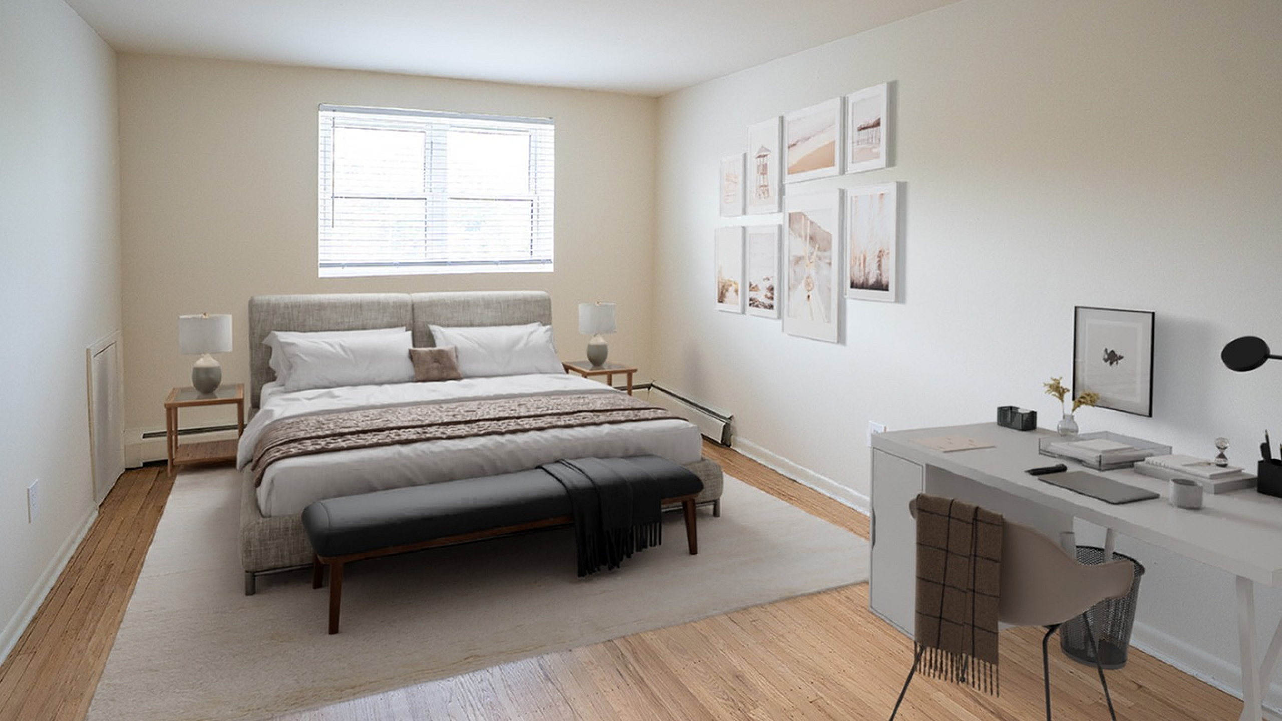 Elegant bedroom with large windows, stylish decor, and a cozy workspace, offering a tranquil retreat.