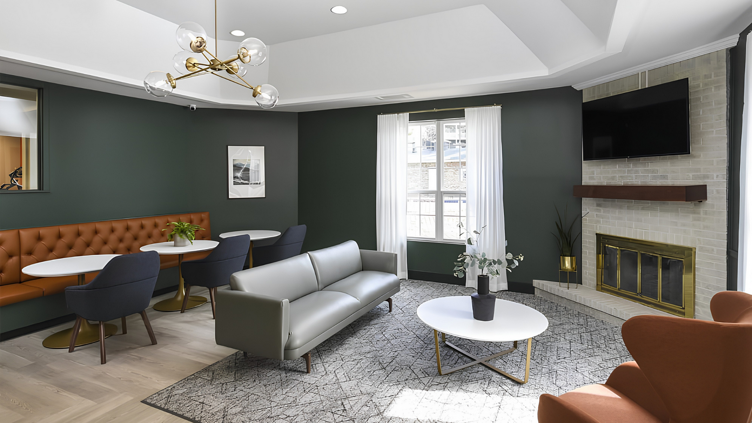 Chic apartment lounge with modern furniture, elegant lighting, and a cozy fireplace.
