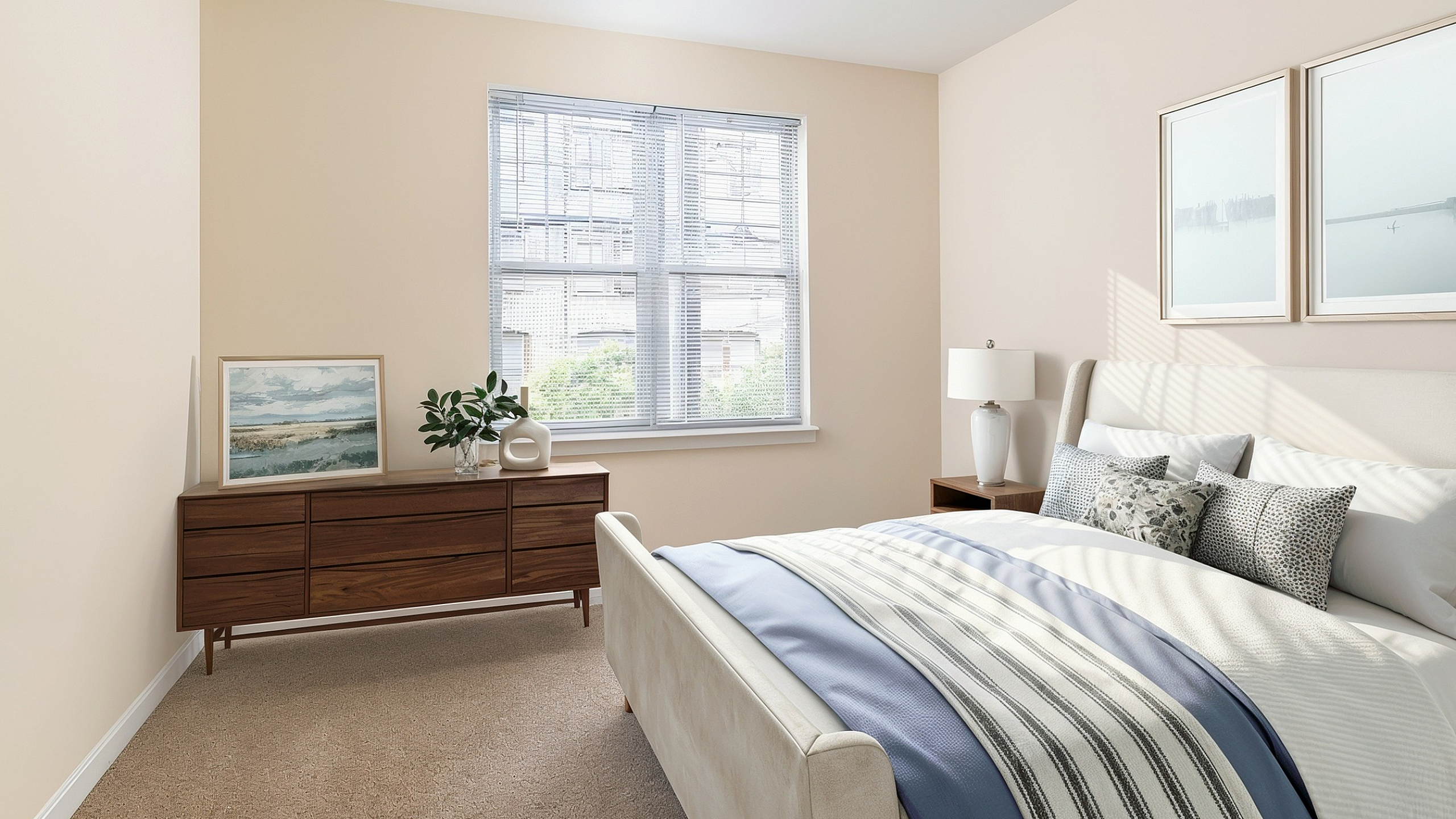 Bright and inviting bedroom with a modern design, featuring large windows, stylish decor, and a cozy bed.