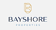 Elegant Bayshore Properties logo featuring a modern gold and navy blue design.