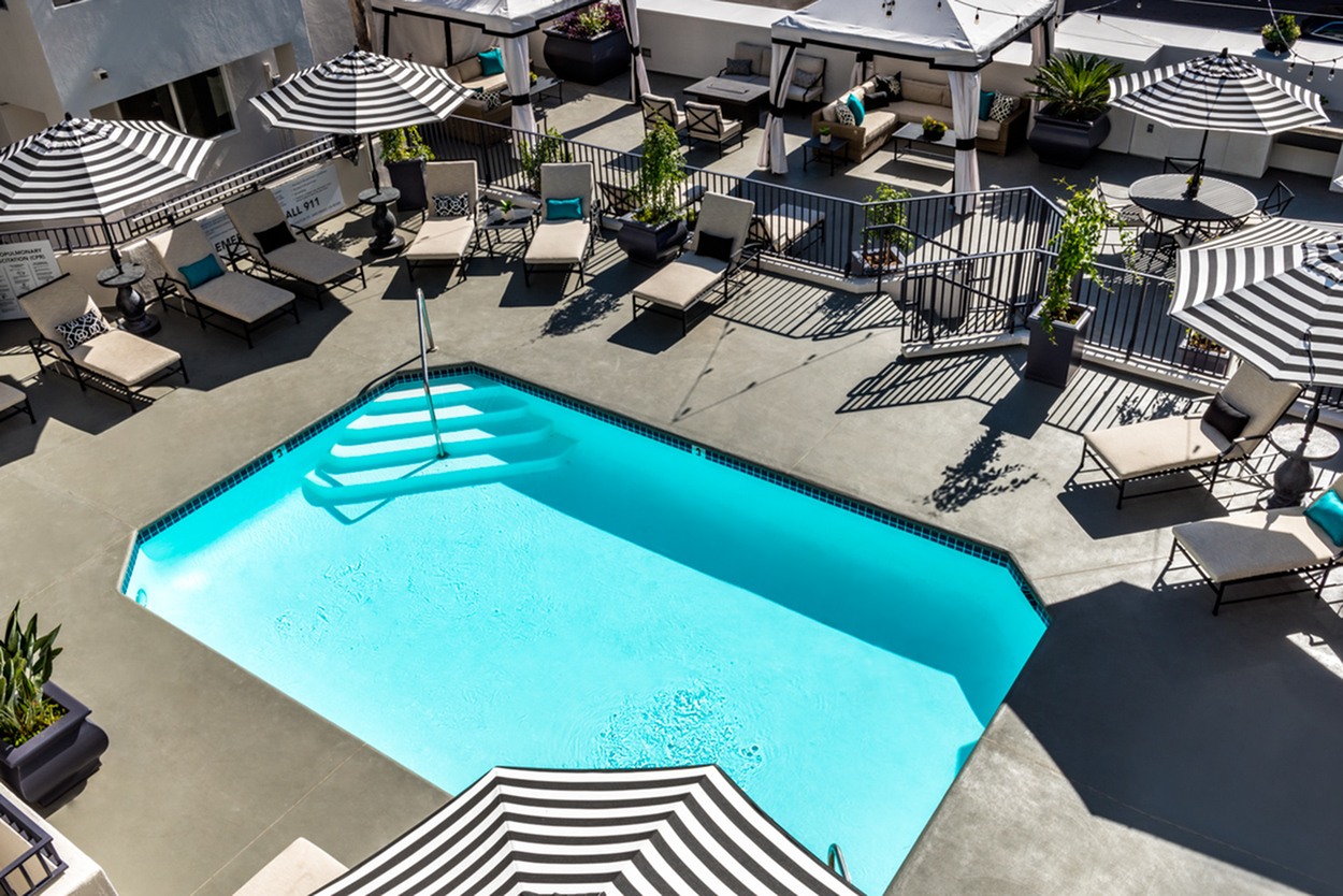 Image of Resort-Style Pool & Lounge Area for The Warwick