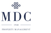 Elegant MDC Property Management logo showcasing sophisticated design since 1948.
