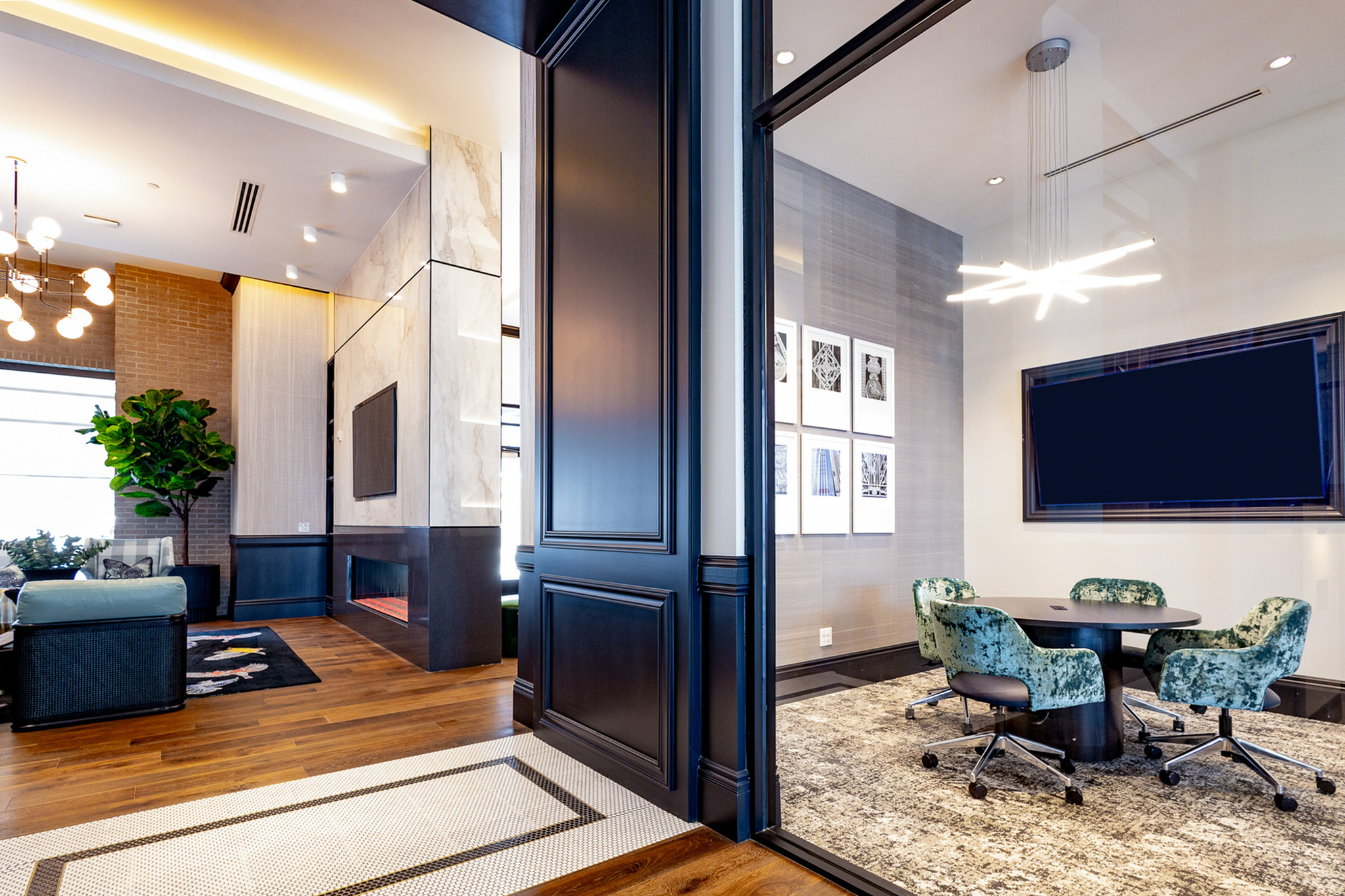 Conference room and contemporary resident lounge at Woodburn Exchange apartments in Cincinnati