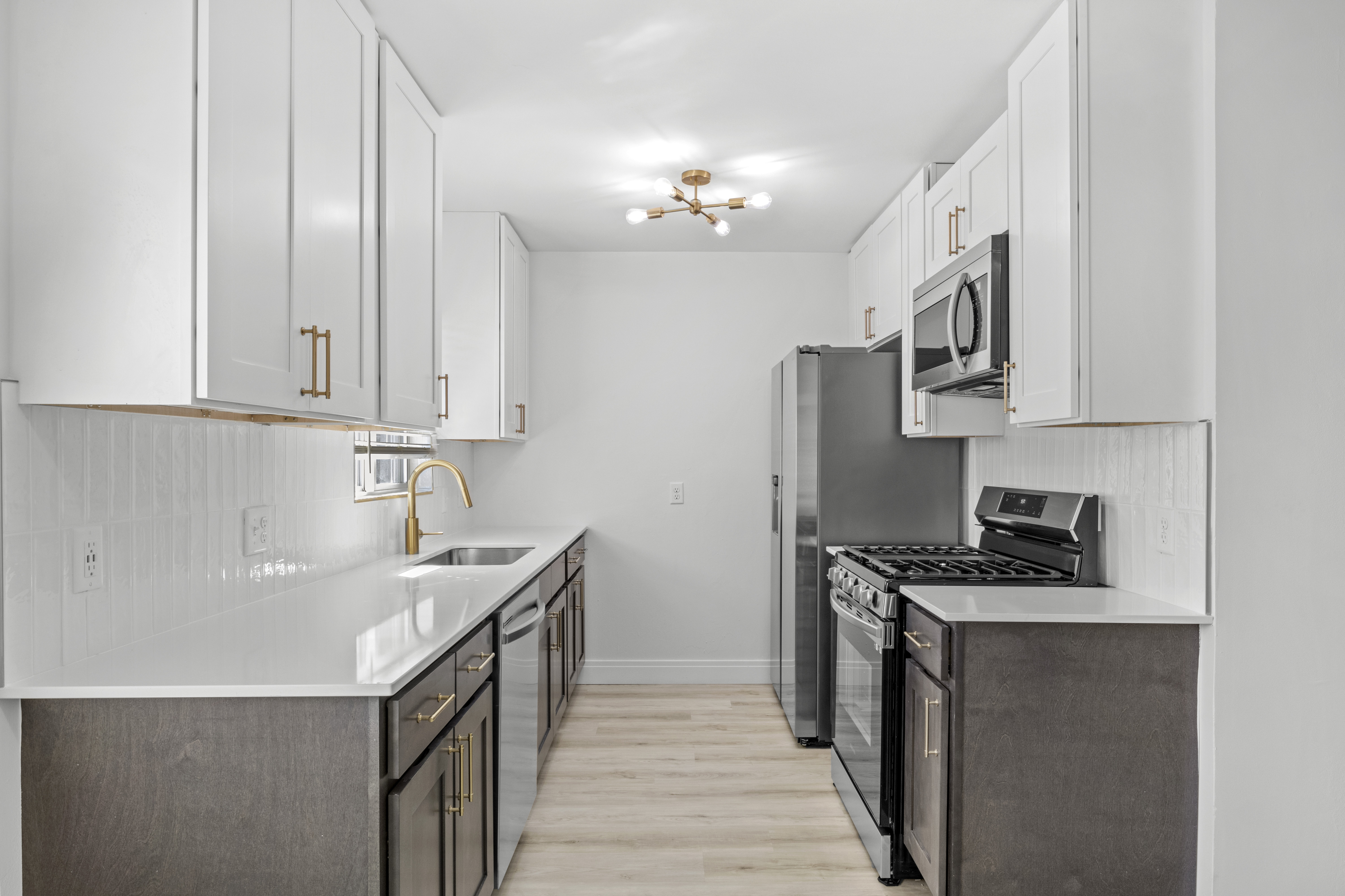 Renovated kitchen with stainless-steel appliances