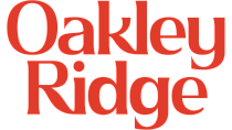 Elegant Oakley Ridge logo in bold red script, perfect for upscale branding.