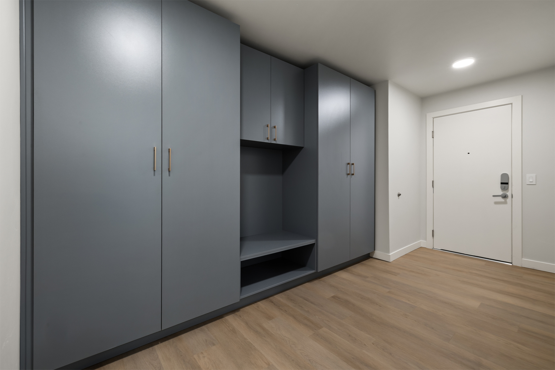 Expansive penthouse walk-in closet at Sugar Alley featuring full-height shelving and abundant storage space.