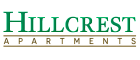 Hillcrest Apartments logo with green and brown lettering