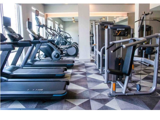 fitness center with treadmills