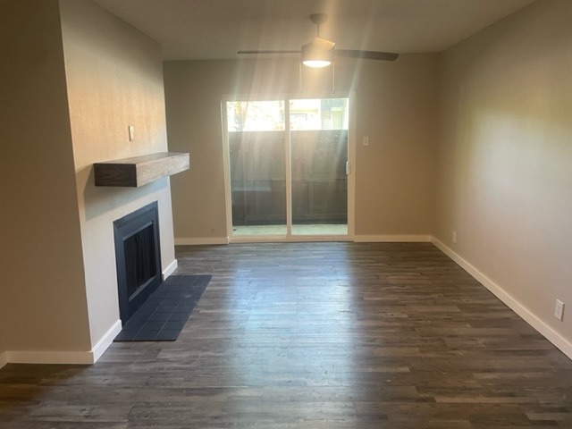 Living Area with Fireplace and Mantle