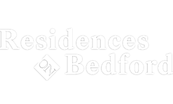 Modern logo for Residences on Bedford, featuring elegant white text on black background with a diamond accent.