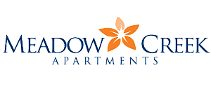 Elegant Meadow Creek Apartments logo featuring a stylized orange flower symbolizing vibrant and welcoming living spaces.