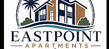 Charming nautical-themed logo for Eastpoint Apartments, featuring a stylish coastal house, ship wheel, and palm tree.