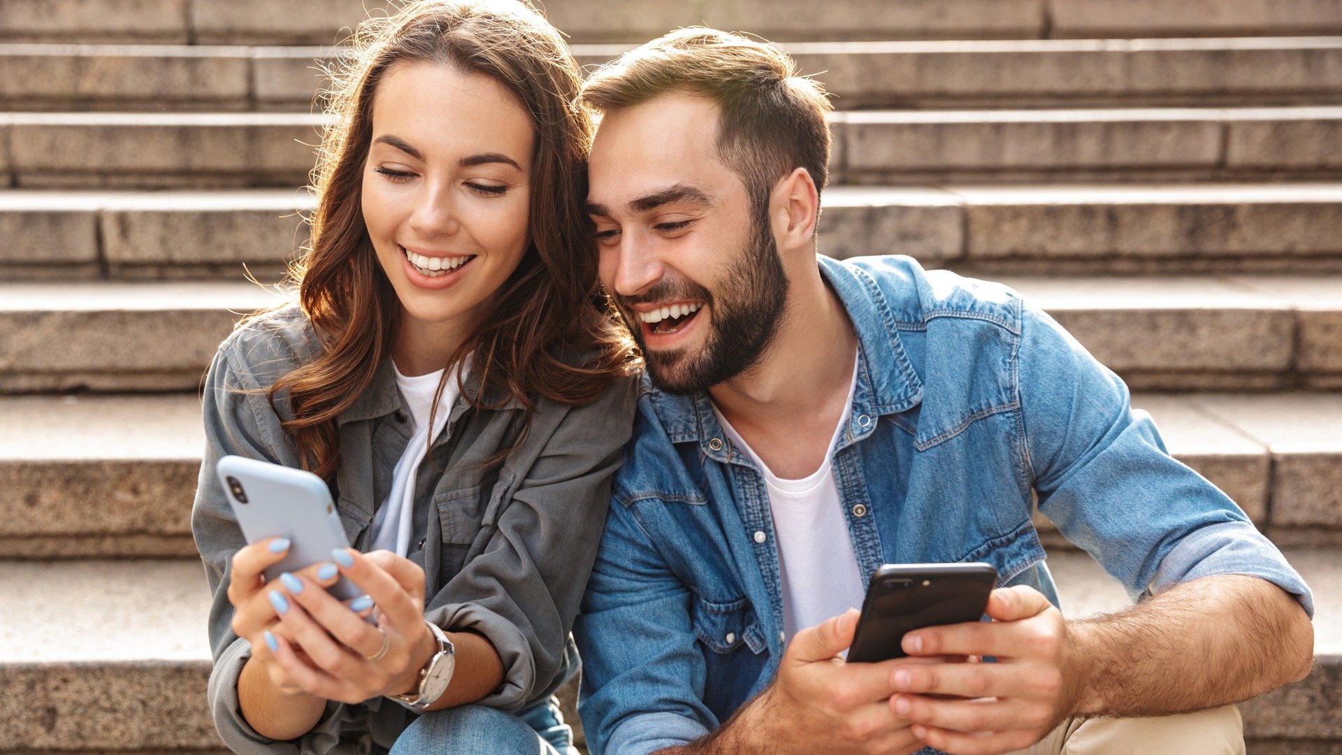 photo of people on their phones applying for apartment