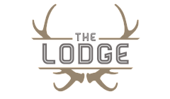 Stylish logo of The Lodge with elegant antler design.