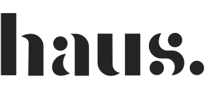 Sleek and modern 'haus' logo in elegant black text on a transparent background, exuding sophistication and style.