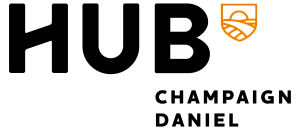 Modern and vibrant logo of UC Merced featuring a stylized orange sun rising over a landscape, set on a sleek black background.