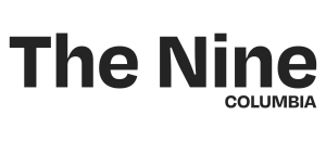 Sleek and modern logo for The Nine Columbia, showcasing elegant typography and contemporary design.