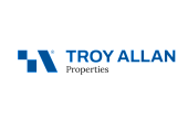 Modern Troy Allan Properties logo with bold blue typography and geometric design.