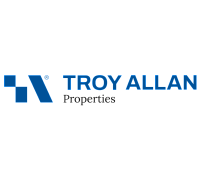 Modern logo design for Troy Allan Properties, featuring bold blue lettering and a sleek geometric symbol.