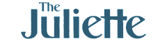 Elegant blue 'The Juliette' logo against a black background.